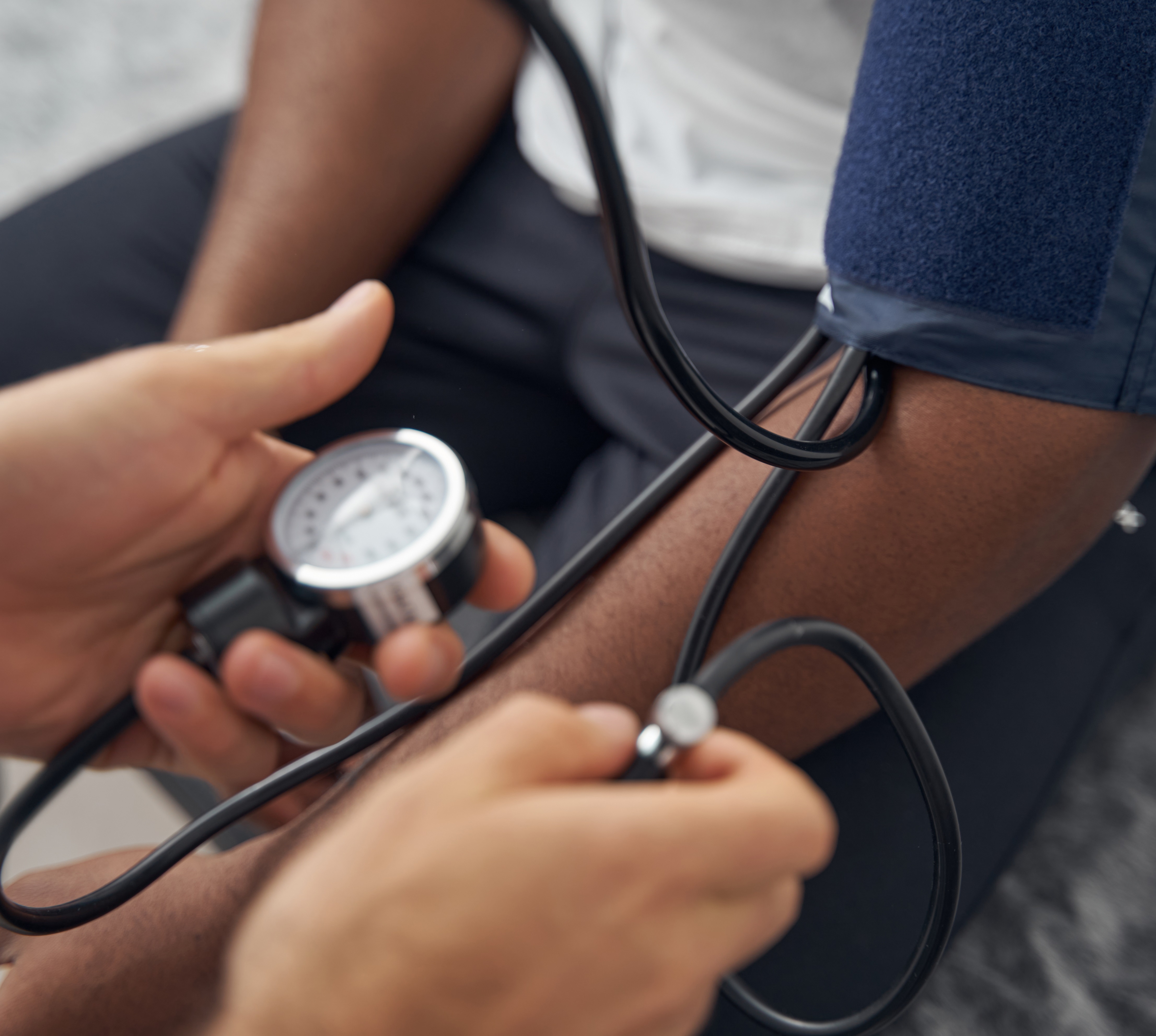 A patient getting their blood pressure taken