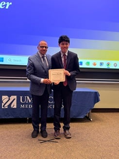 James Minh Ha displays award