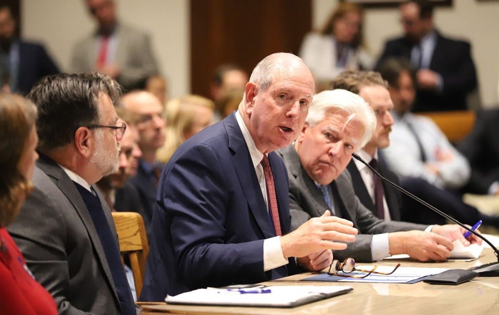Chancellor Collins testifying before the legislature