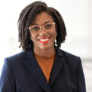  Headshot of Angela Printy wearing a blue blazer and glasses