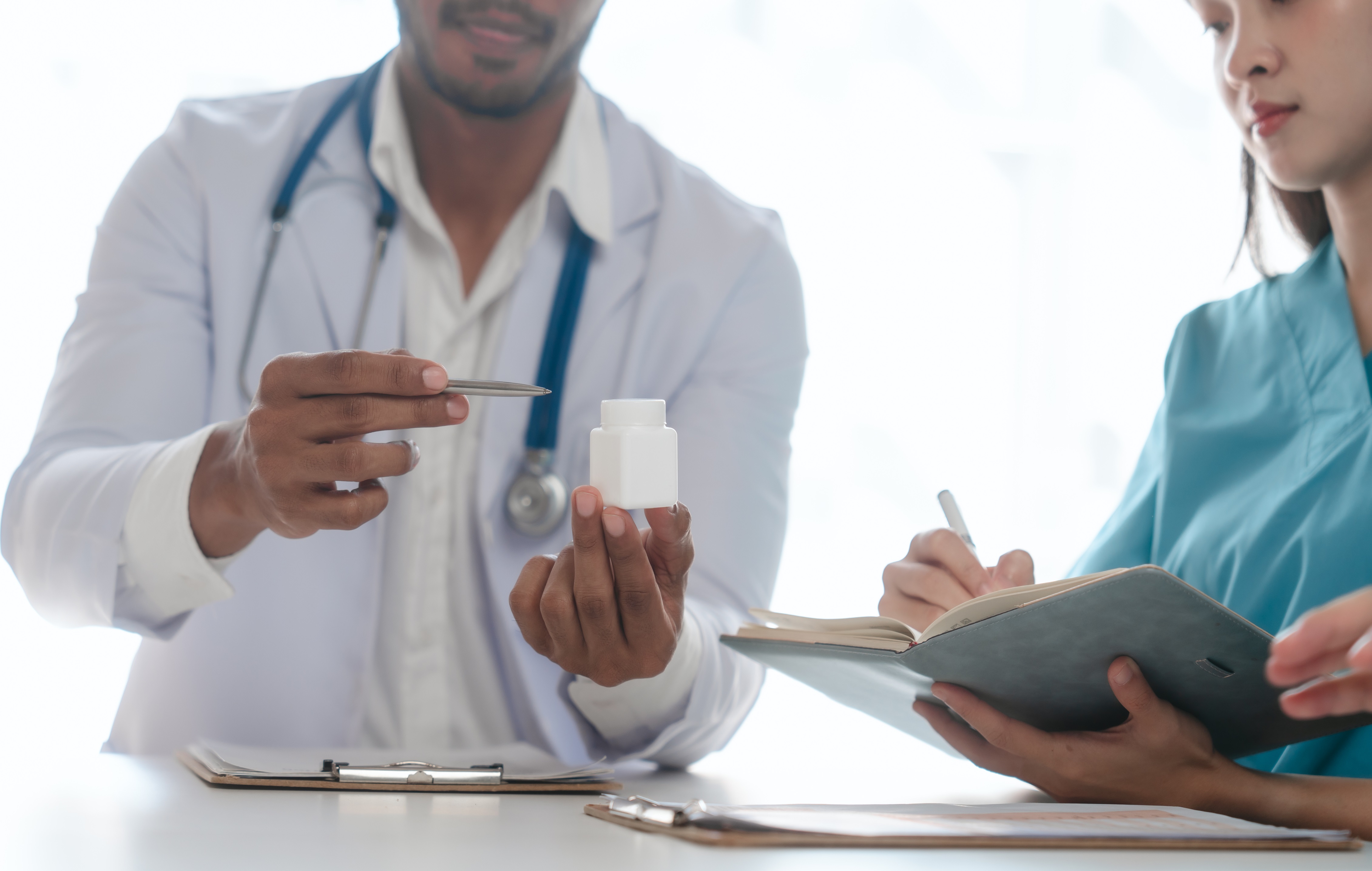Image of two physicians working