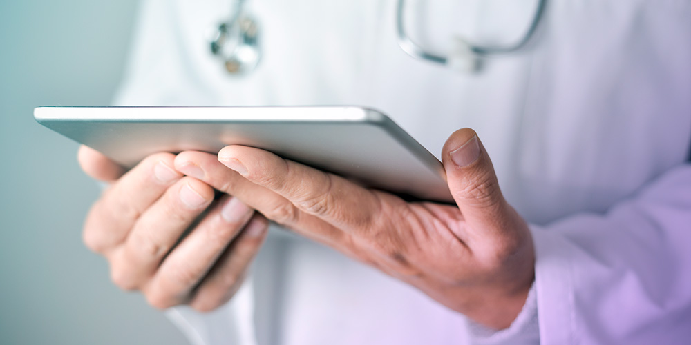 Doctor holding a tablet