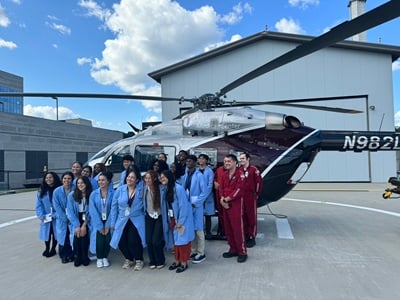 Students in front of Life-Flight helicopter