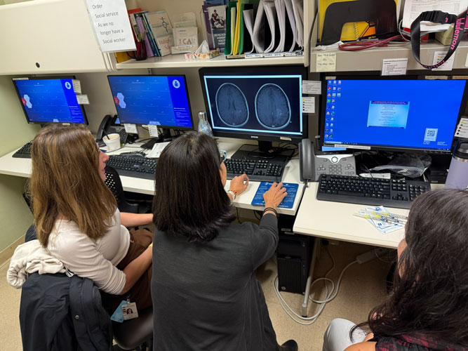 MS Fellowship Team reviewing scan images