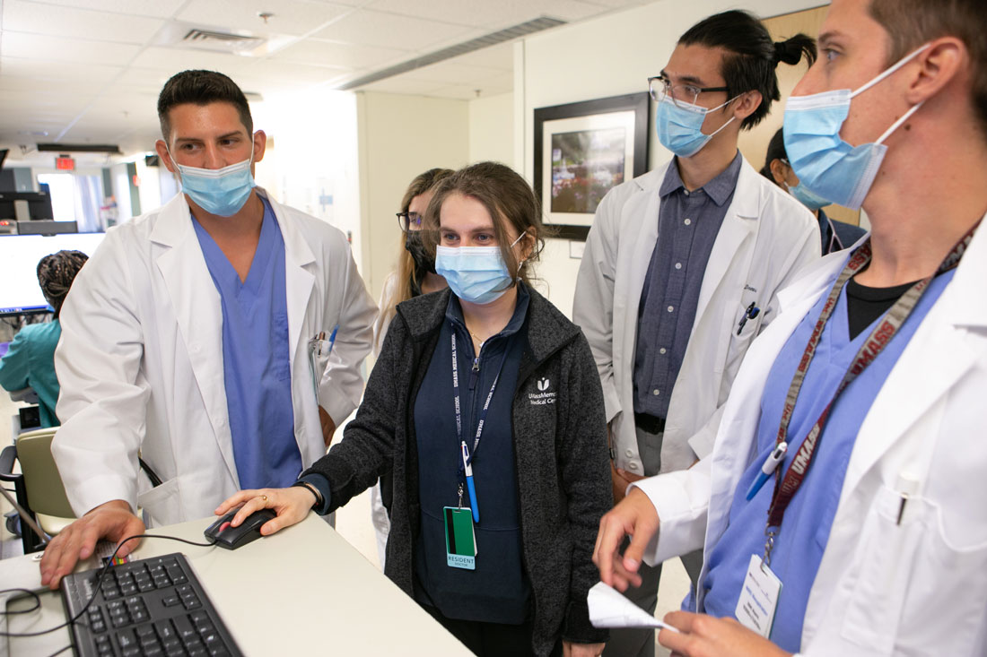 Neurology residents engaging in practical education experience in the clinical setting