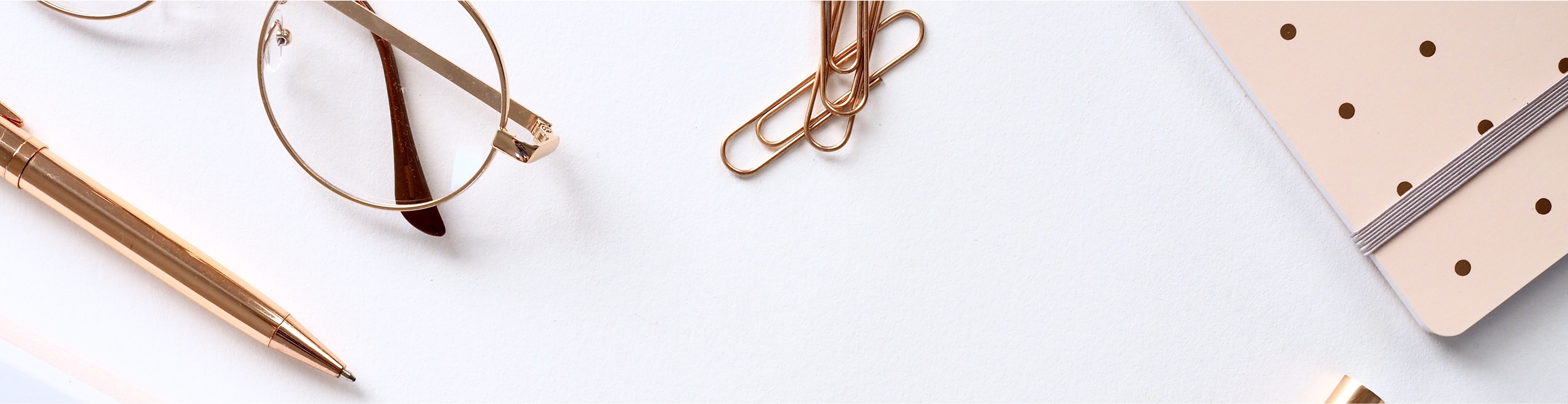 gold pen, glasses, paperclip, and notebook. Photo courtesy of JessBaileyDesign, pixabay