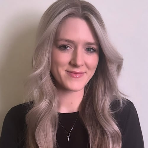 white woman with long blonde wavy hair