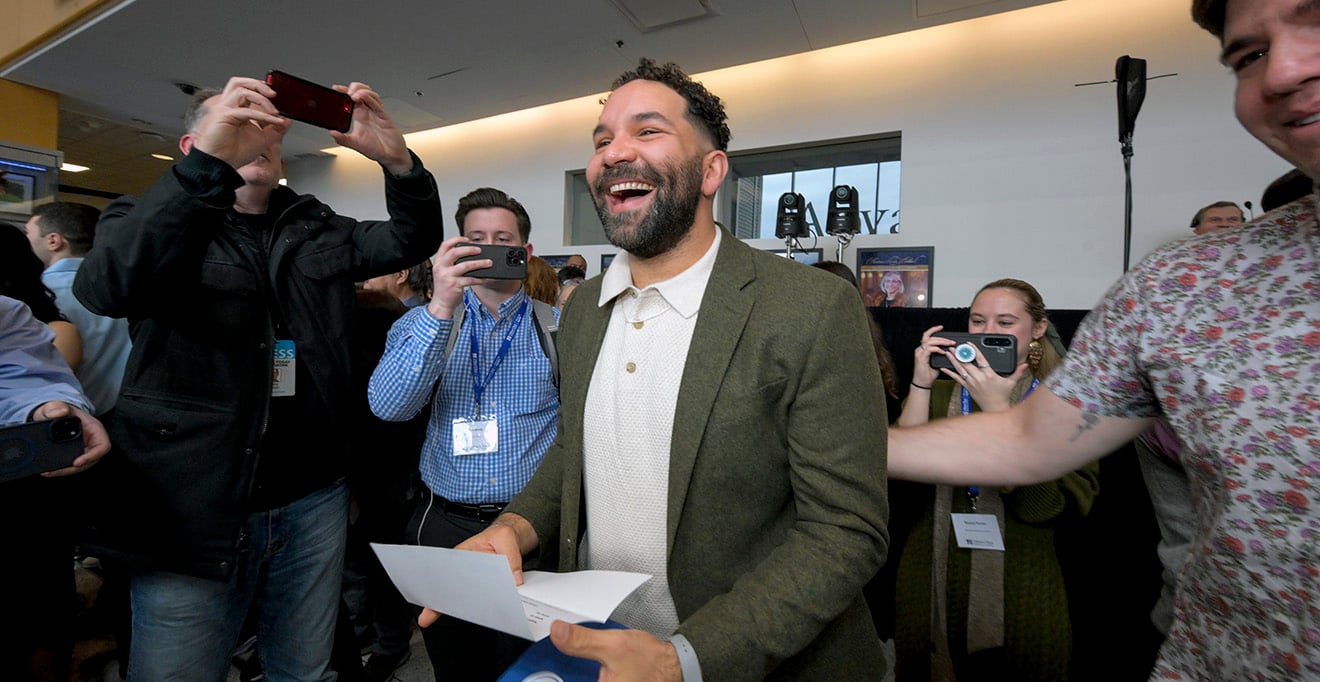 MD/PhD student Zach Dyer, MPH, is all smiles after opening his match envelope and learning he is headed to Institute for Family Health in New York City for family medicine.