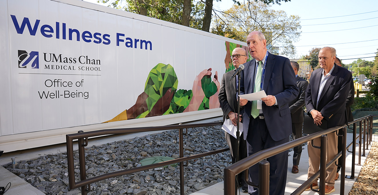 Chancellor Michael F. Collins welcomes the audience to the Wellness Farm ribbon cutting ceremony